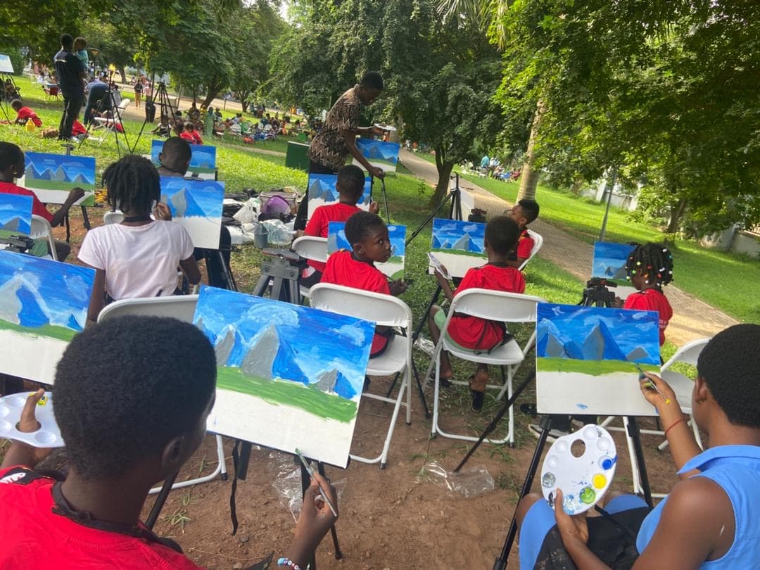 Thrive EDU students painting a landscape on their easels